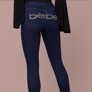 Bebe rhinestone logo logo skinny jeans rinse wash size 26 NEW
